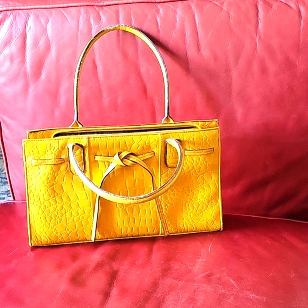 Mustard yellow leather purse.
